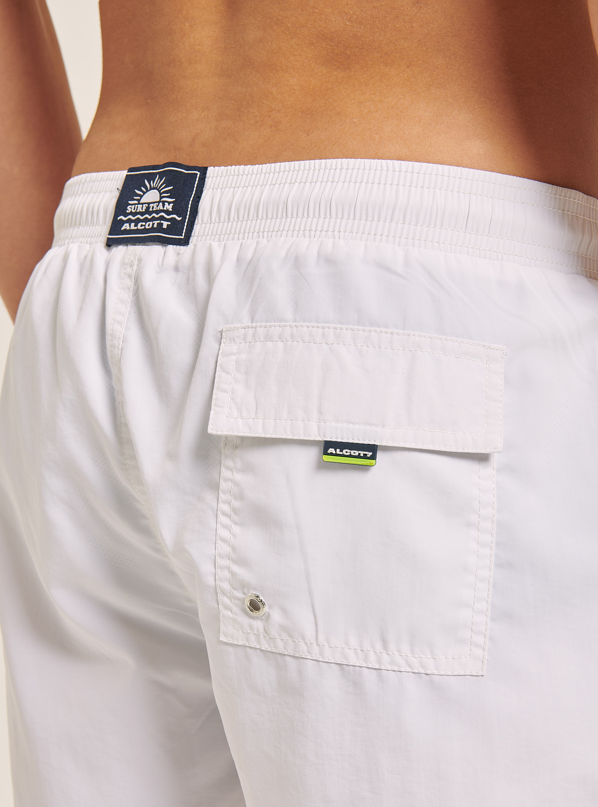 Costume tinta unita con ricamo e tasca sul retro, BIANCO