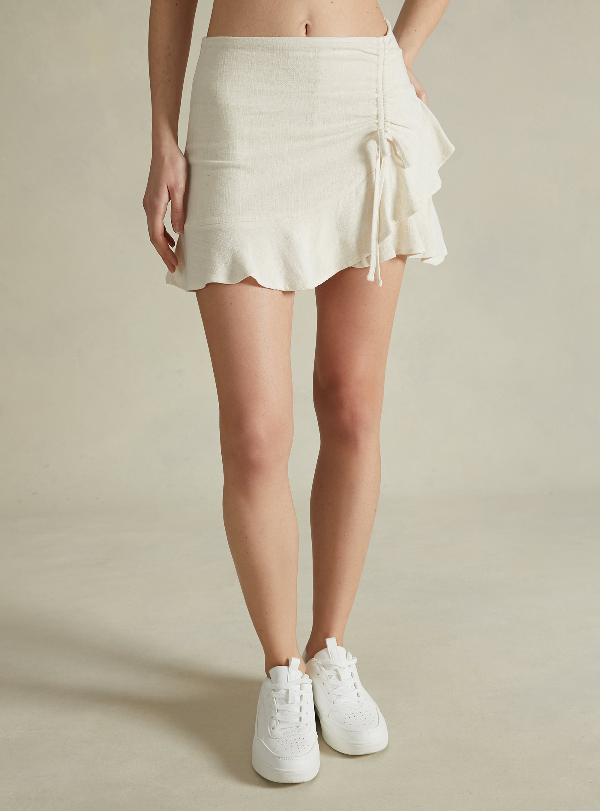 Mini skort with ruffles in linen blend