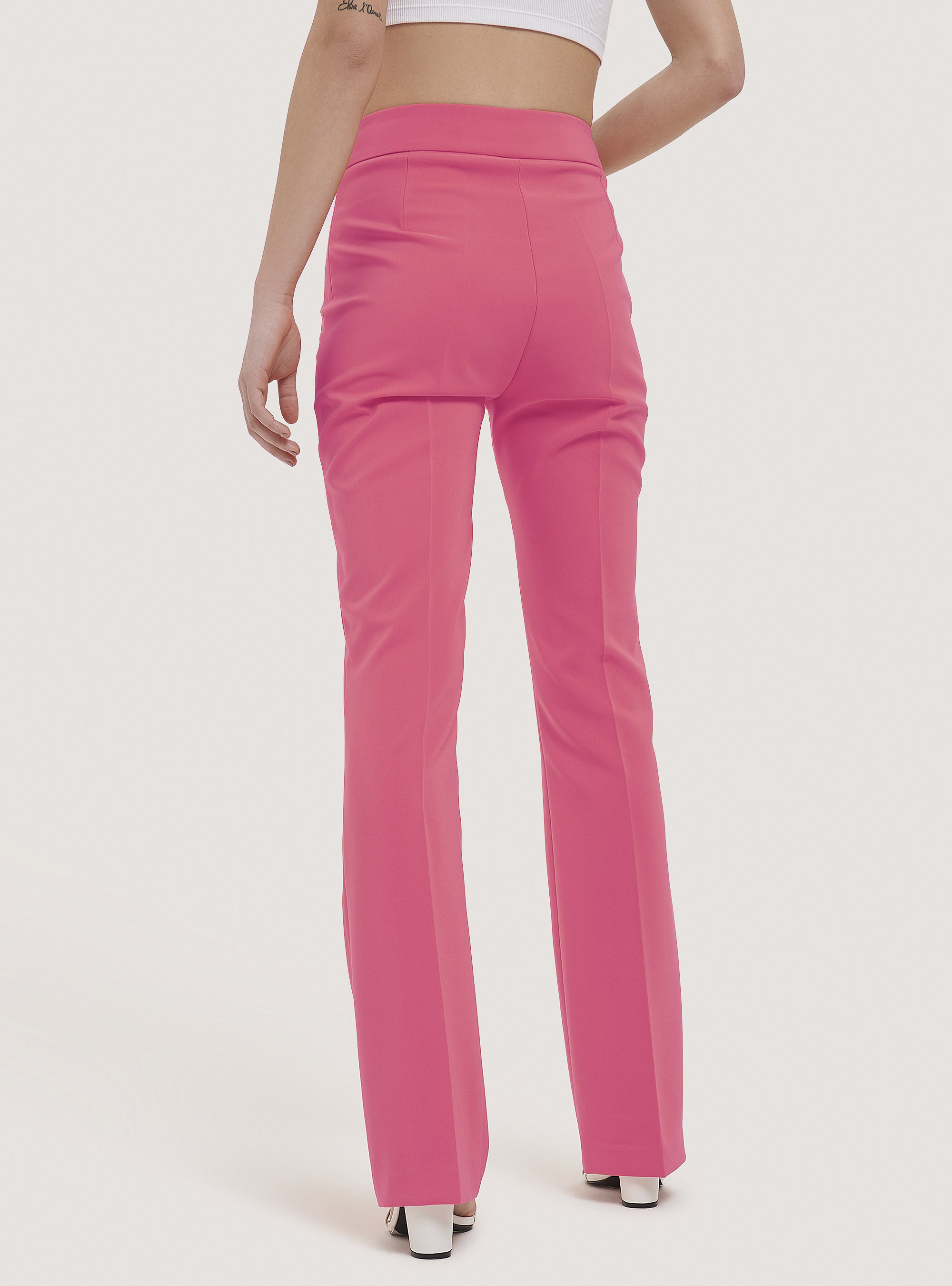 Pantaloni flare in tinta unita