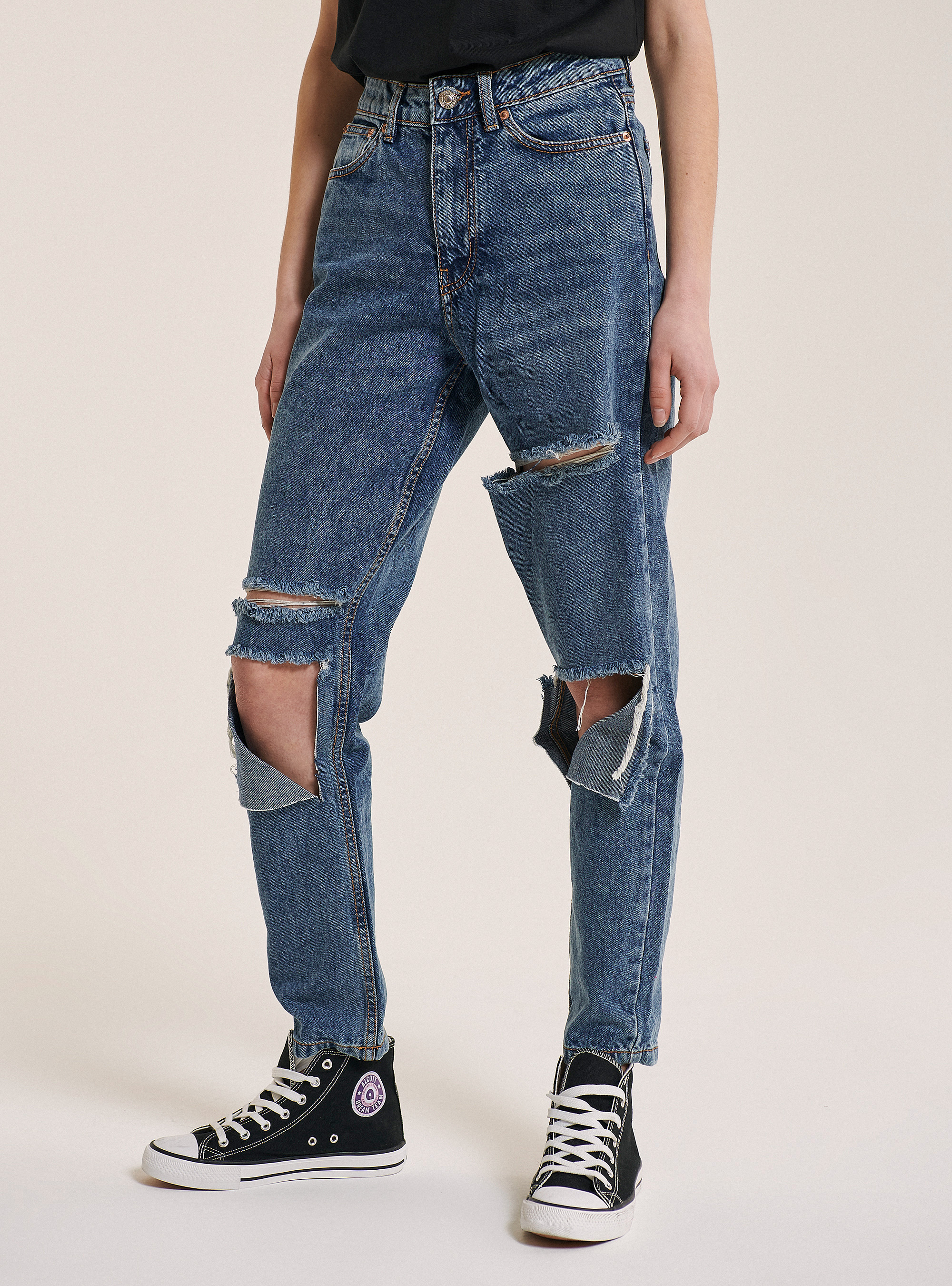 white pants with blue stripes