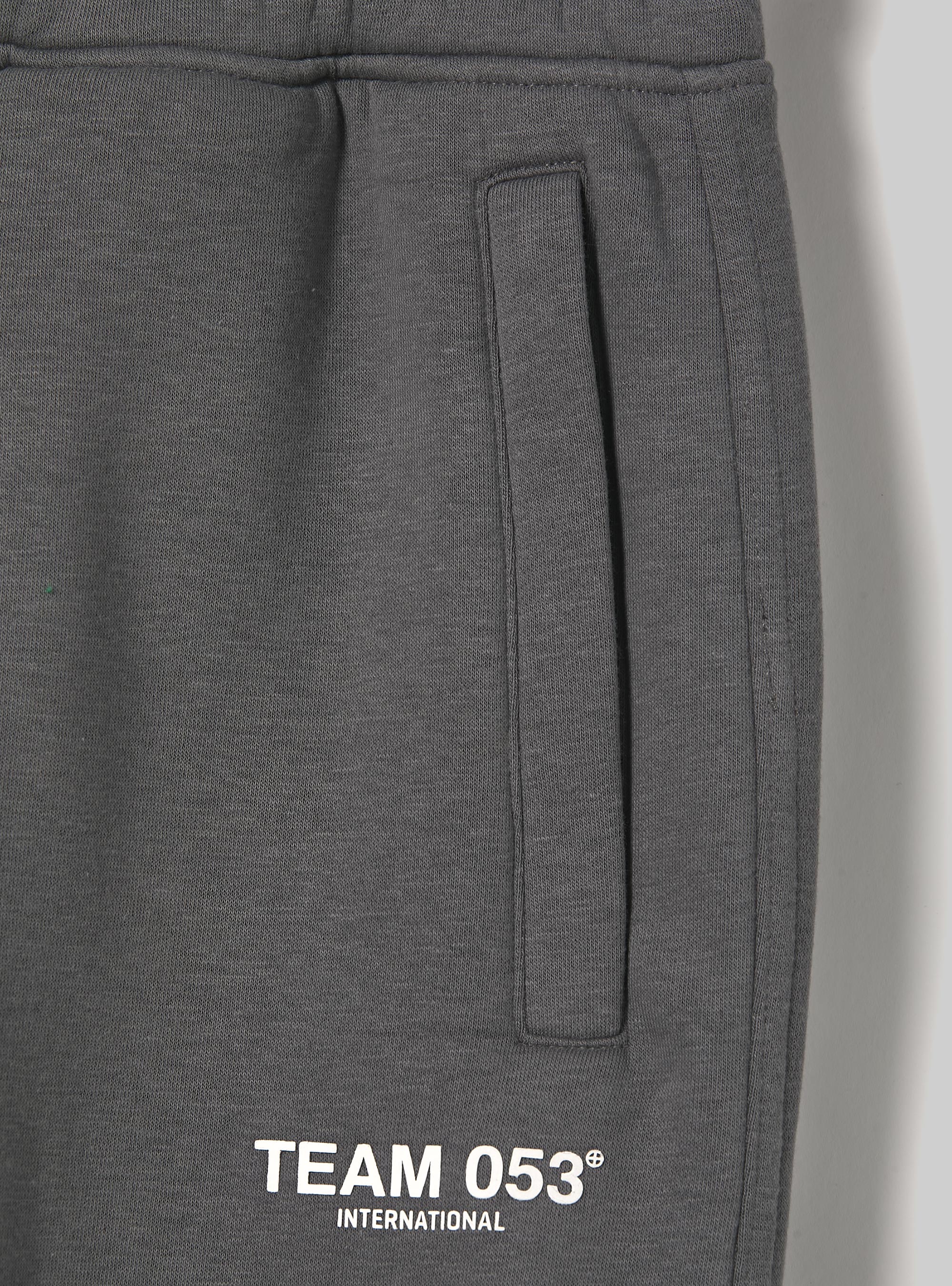 Jogger trousers with Team 053 print, GY1 GREY DARK