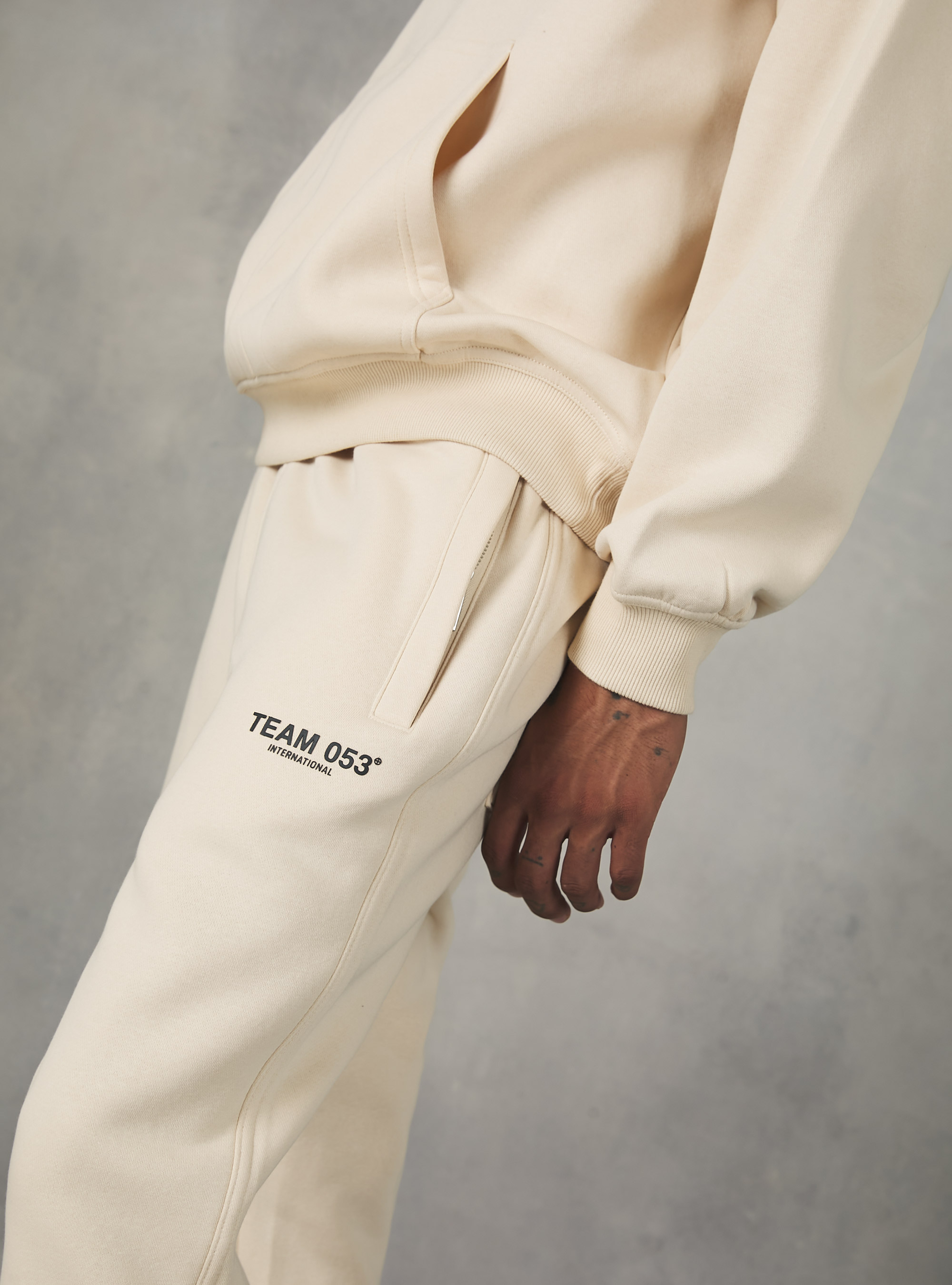 Jogger trousers with Team 053 print, SA2 SAND MEDIUM