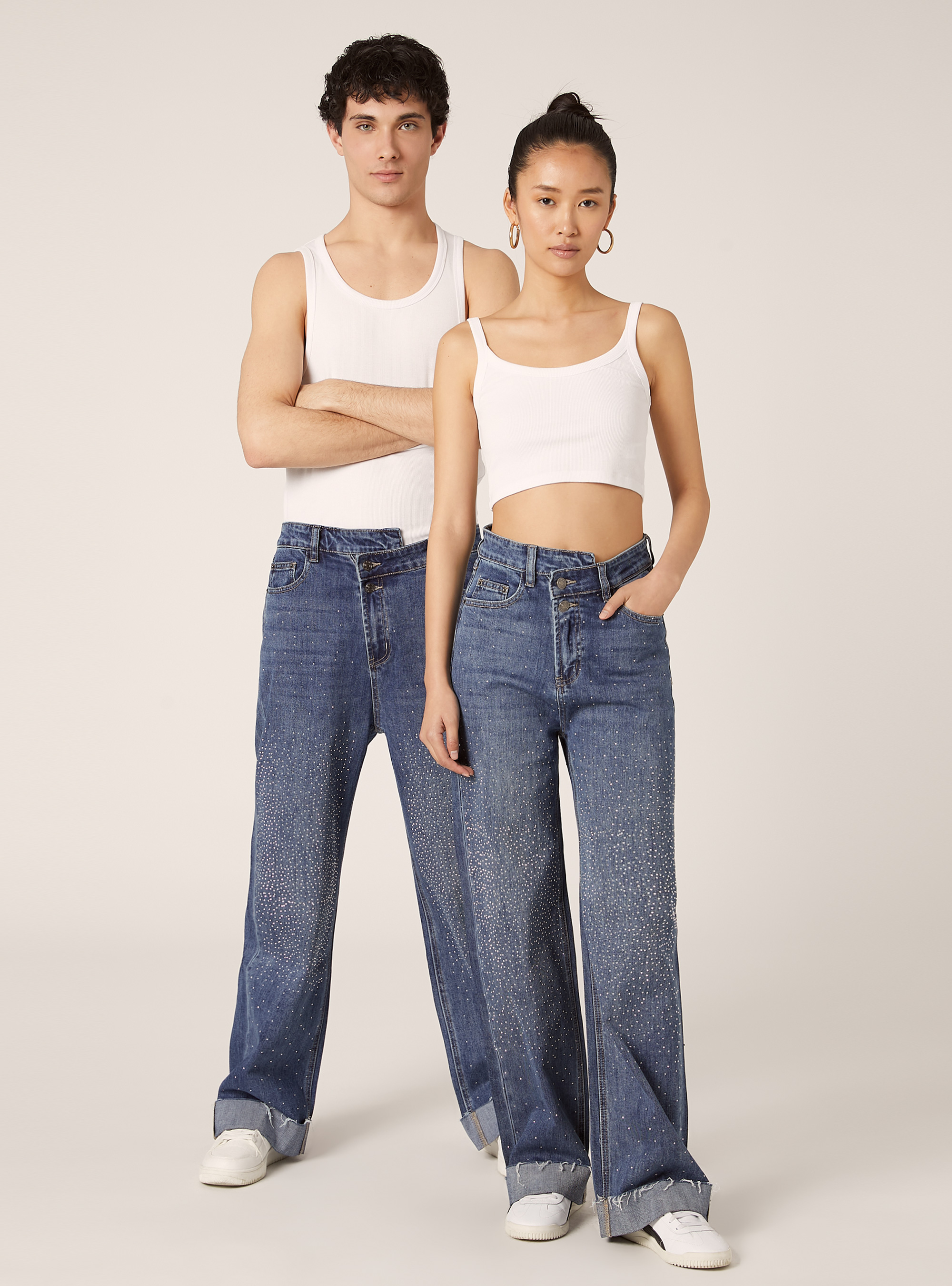 Wide leg jeans with rhinestones and asymmetric waistband