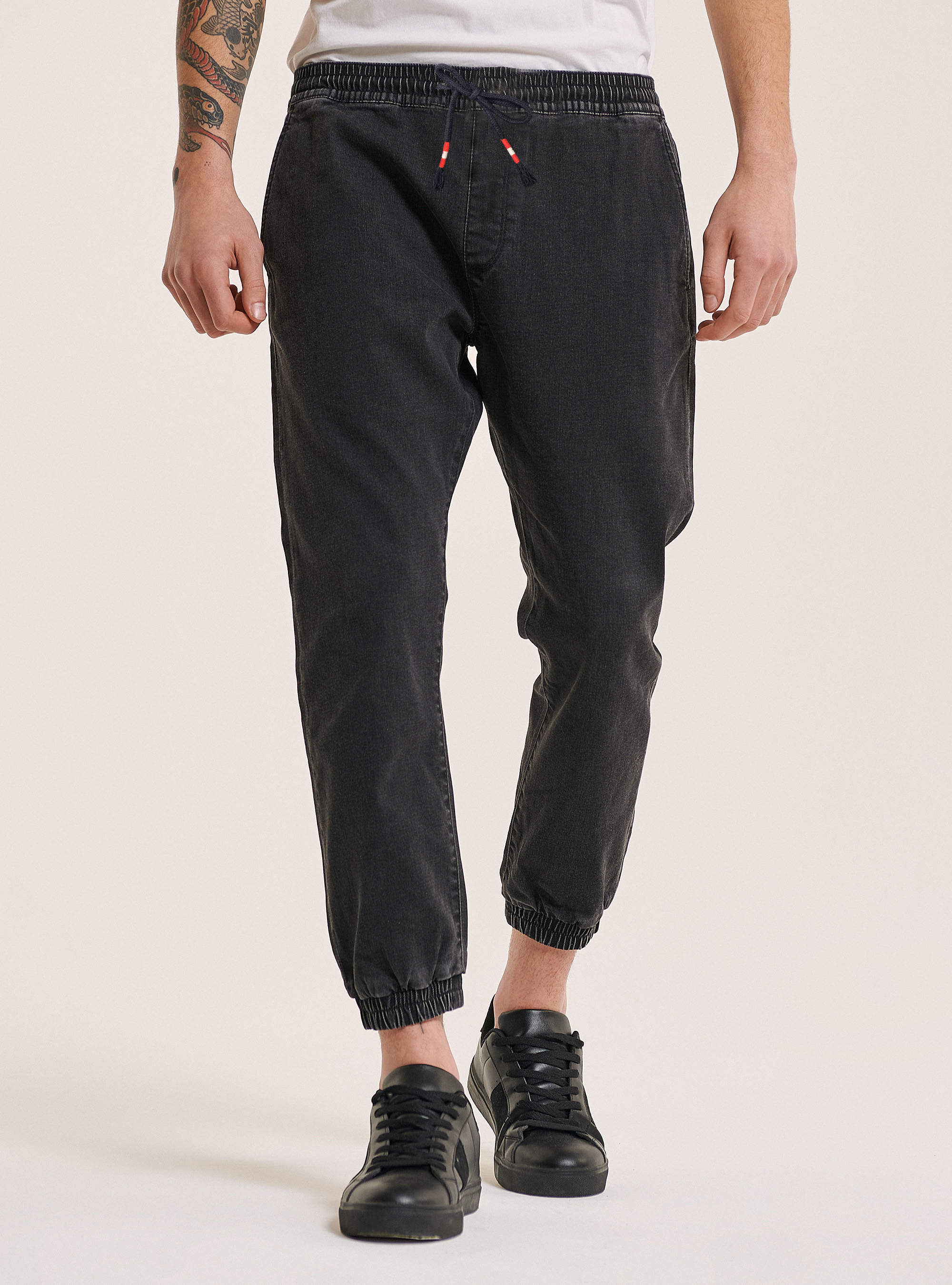 Stretch denim jogger trousers with elasticated waistband, BLACK