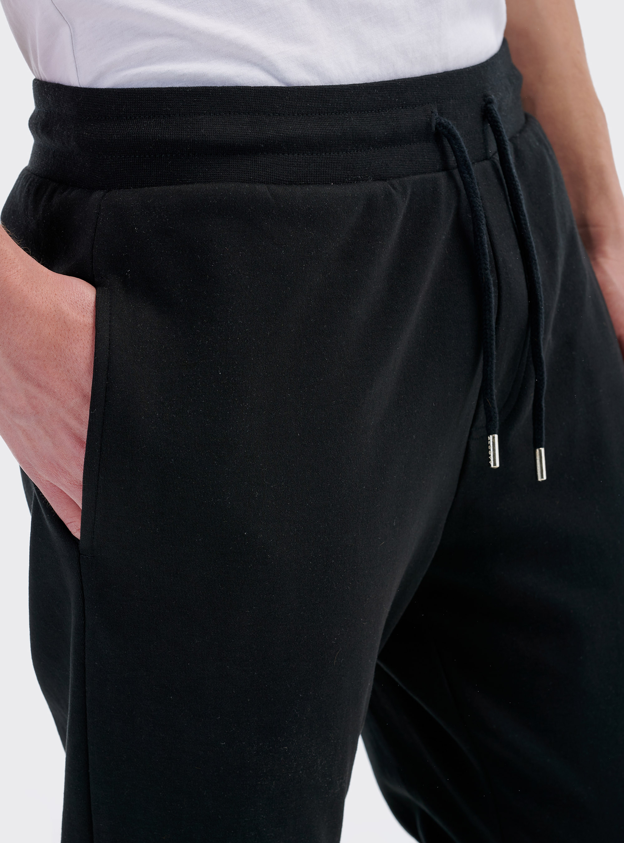 Jogger con zip sul fondo, NERO