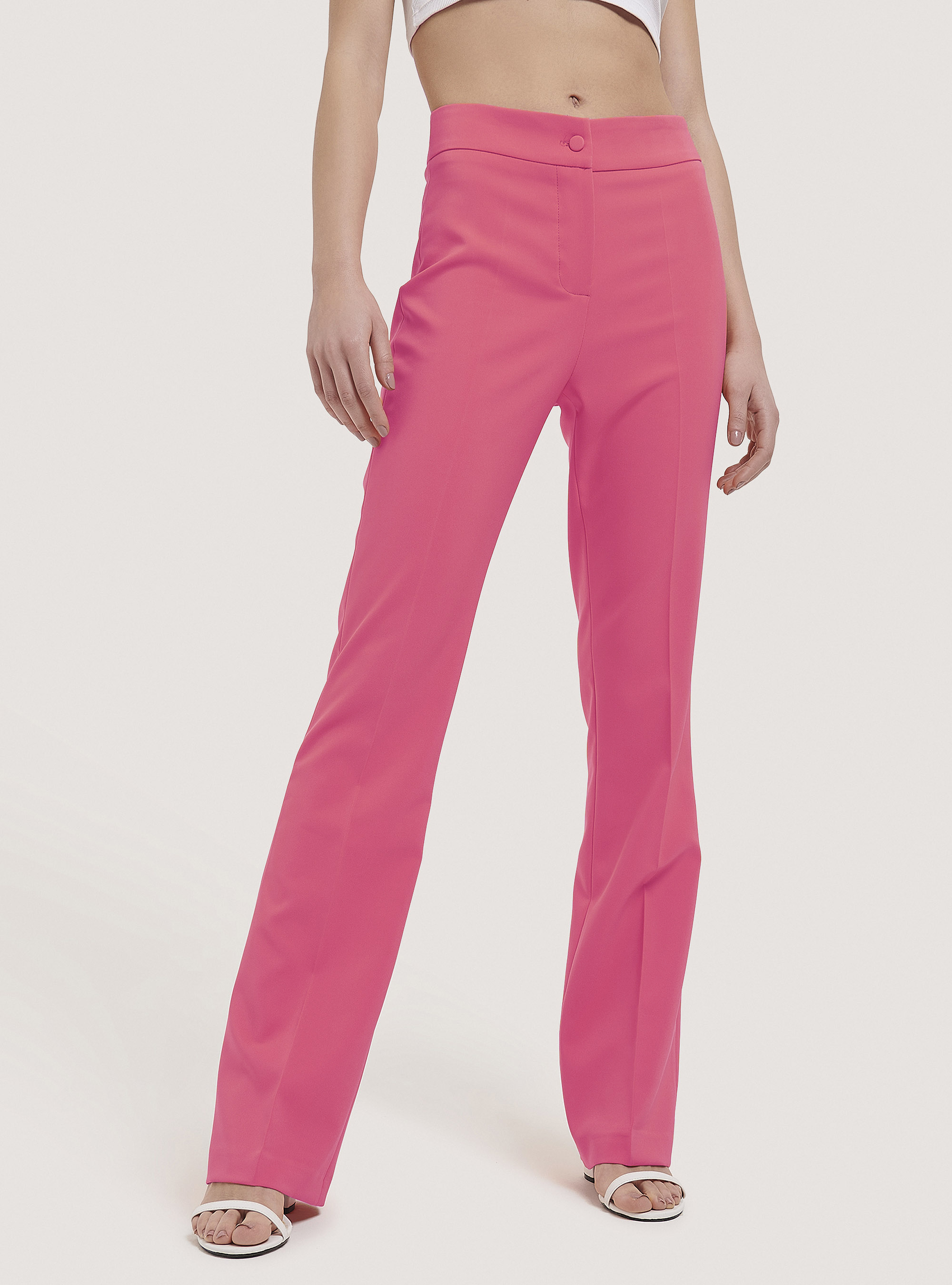 Pantaloni flare in tinta unita