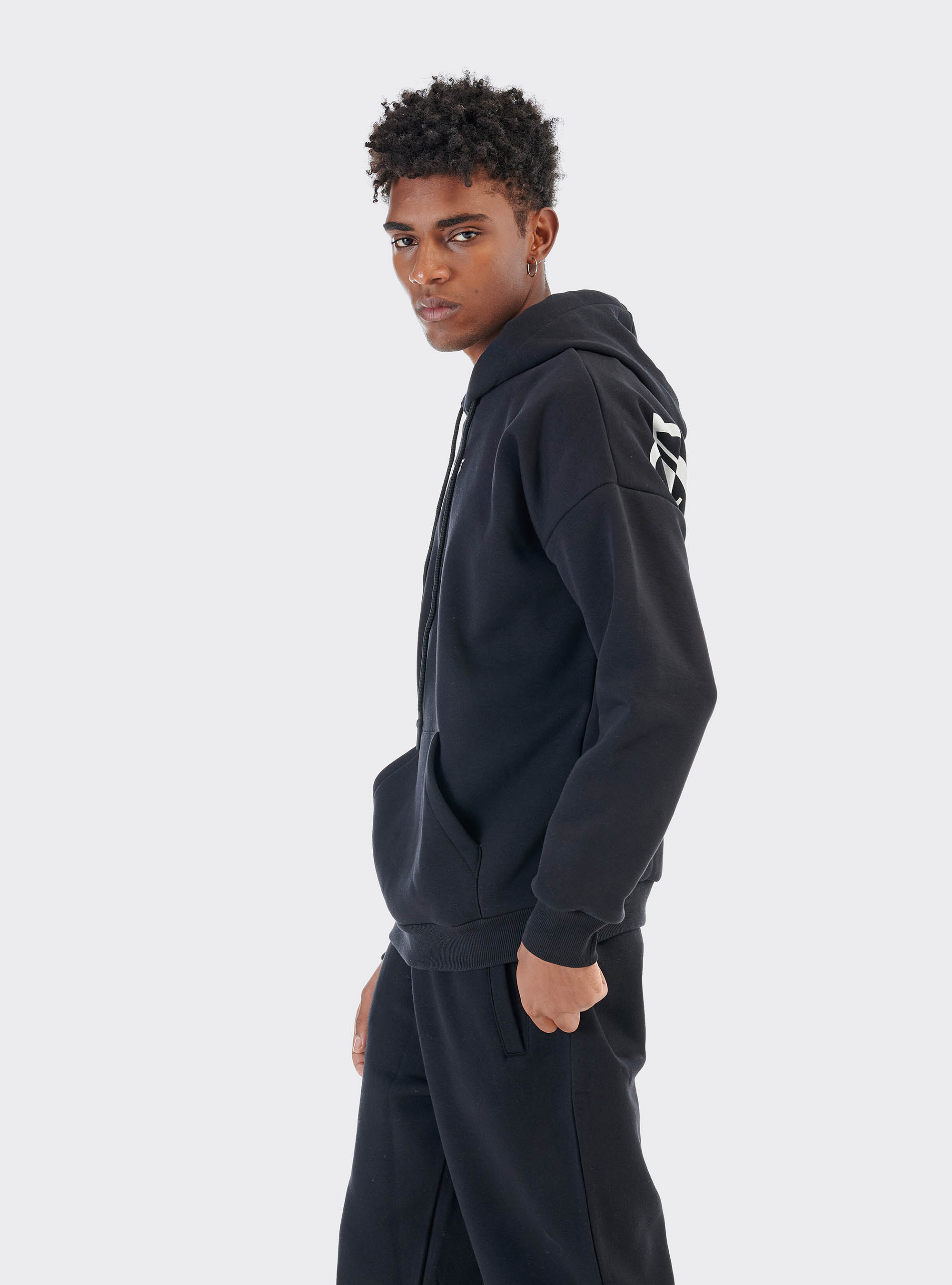 Felpa over con cappuccio e stampa Rockstar, NERO