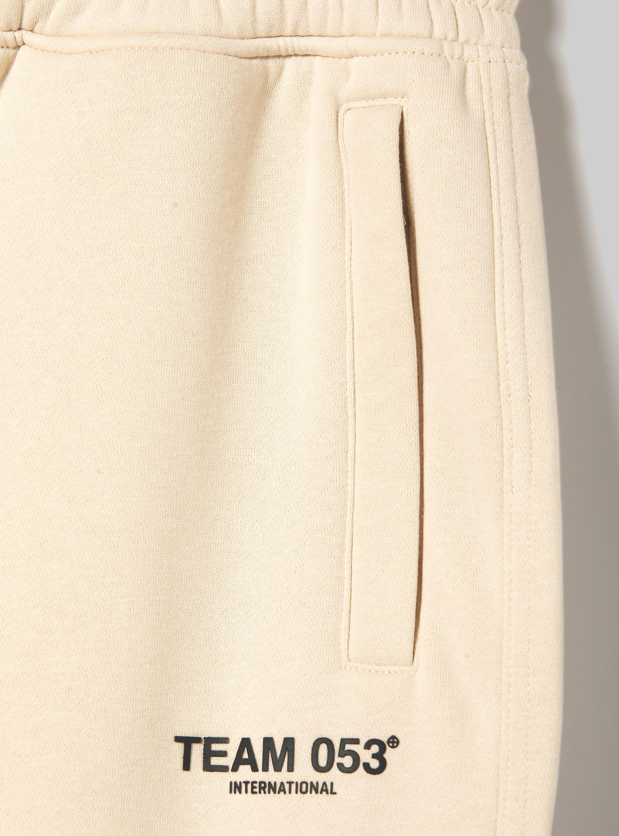 Jogger trousers with Team 053 print, SA2 SAND MEDIUM