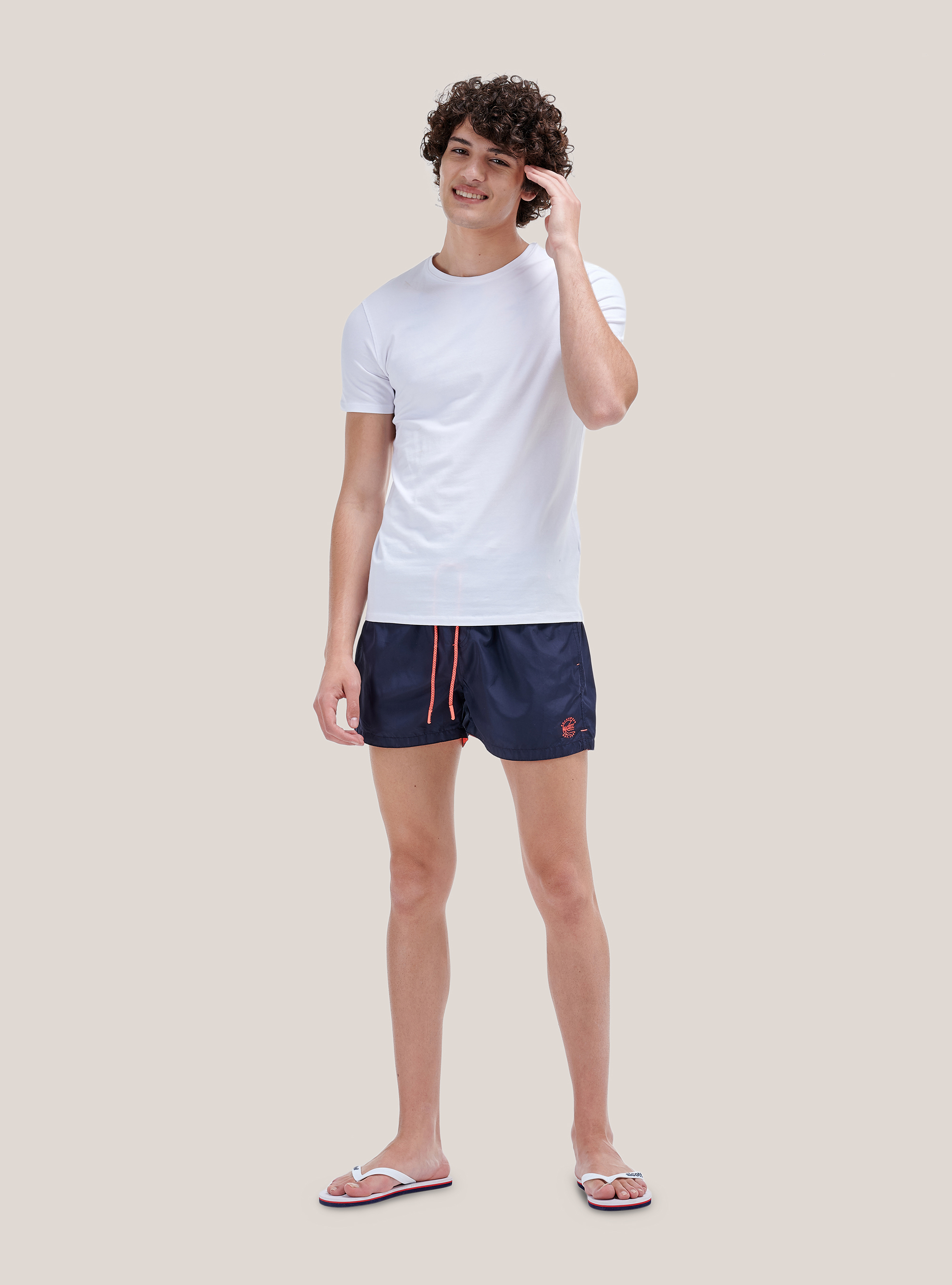 Color solid swimsuit with front embroidery and back pocket., BLUE NAVY