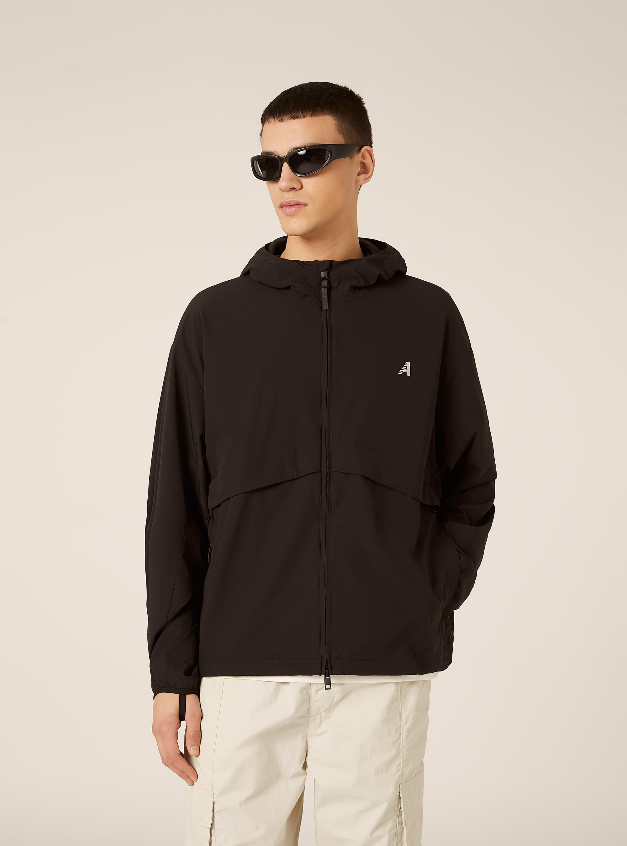 Antivento in tessuto tecnico  con cappuccio, BK1 BLACK